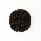 STRANDED HEAT RESISTANT CURLY MESSY BUN
