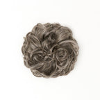 STRANDED HEAT RESISTANT CURLY MESSY BUN