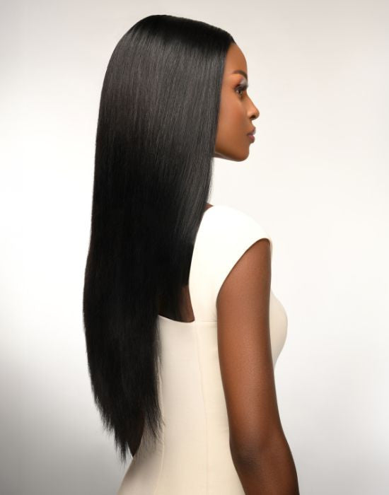 Straight natural dark human hair weave on model with Feme 100% human hair weave packaging